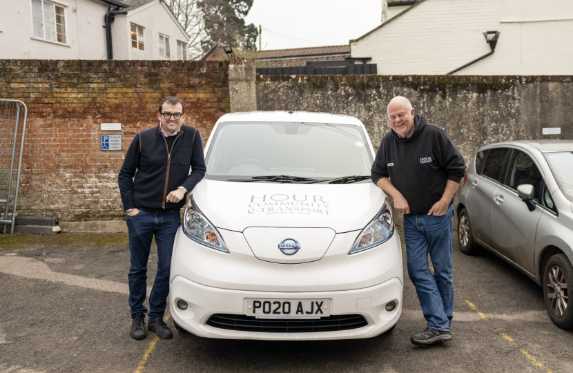 2 men with a white van